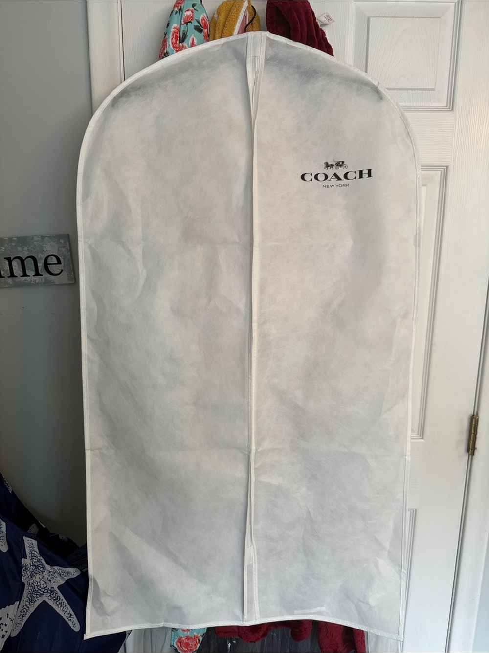 Coach White Garment Bag and Coach branded hanger